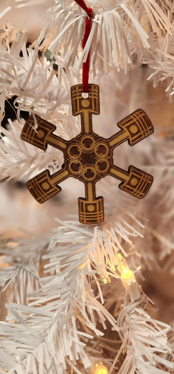 Mechanic snowflake that looks like pistons put into a christmas tree